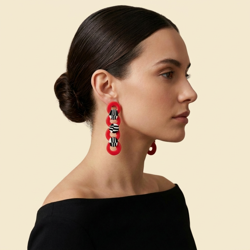 Coral Chain Statement Earrings on cream background