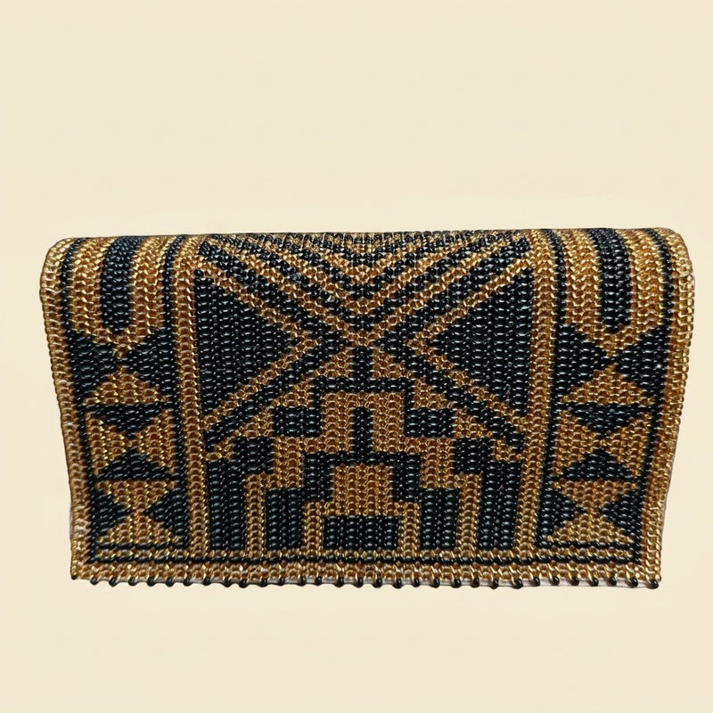 Leopard Print Gold Beaded Clutch on cream background