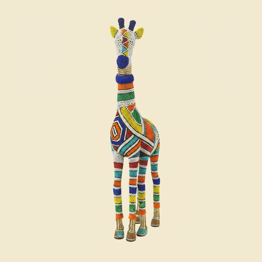 Ndebele Beaded Giraffe Sculpture on cream background