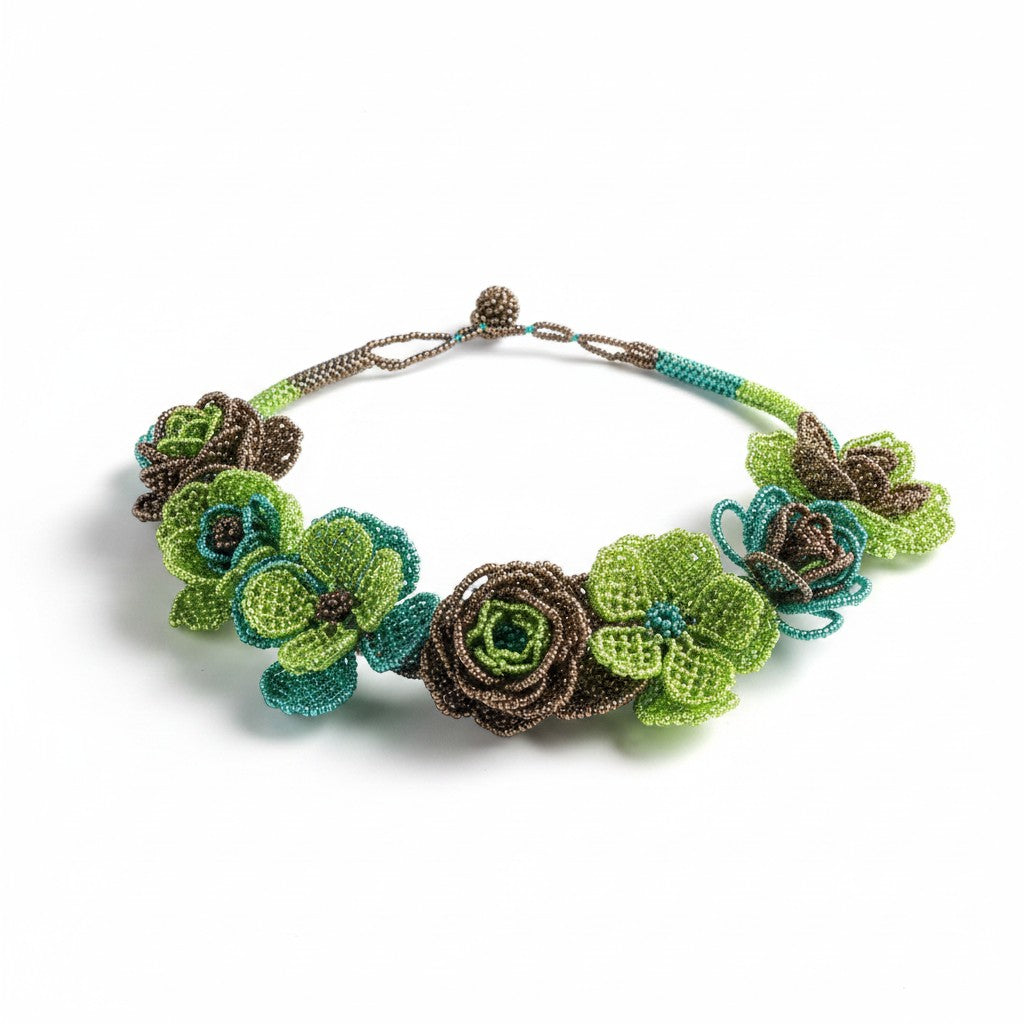 Tinkers handcrafted beaded floral collar necklace with iridescent lime green, teal, and bronze rose blooms.
